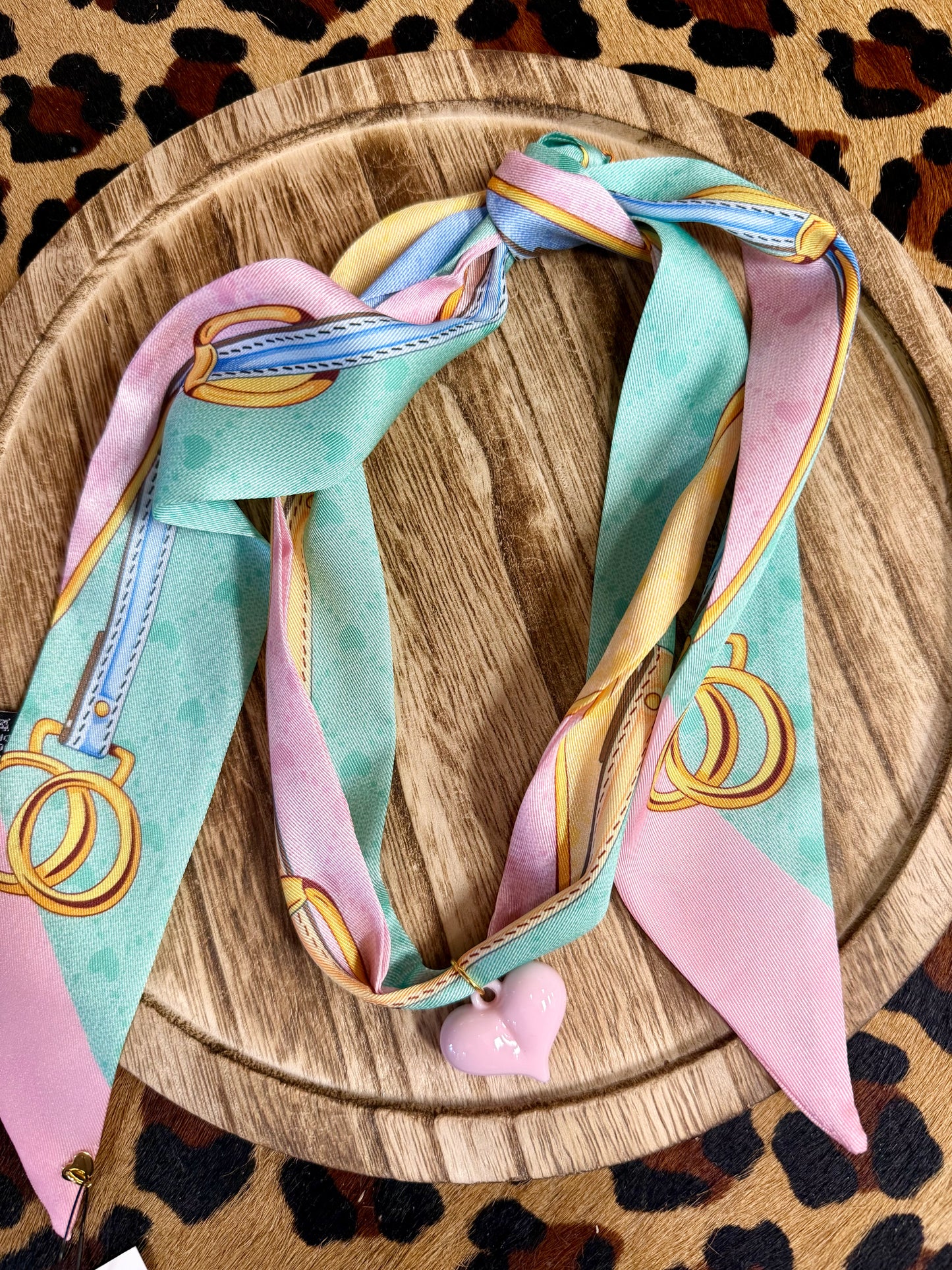 Scarf necklace with charm