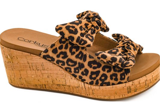 Bowed up leopard wedge